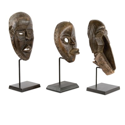 Lot 235 - Group of Three Stained Hardwood Tribal Masks...