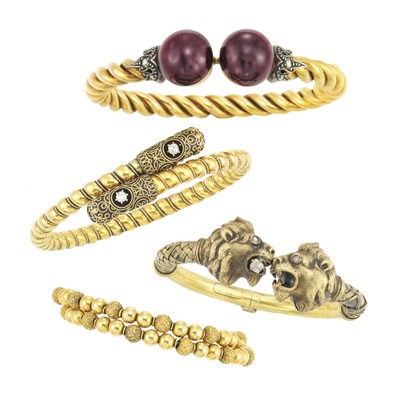 Lot 322 - Four Antique Gold and Diamond Bangle Bracelets