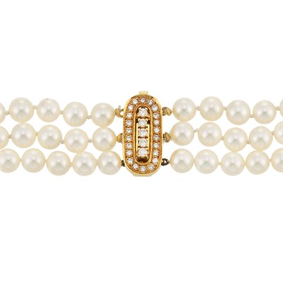 Lot 303 - Triple Strand Cultured Pearl Necklace with Gold and Diamond Clasp