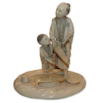 Lot 351 - Japanese Ivory Okimono of a Man and Boy