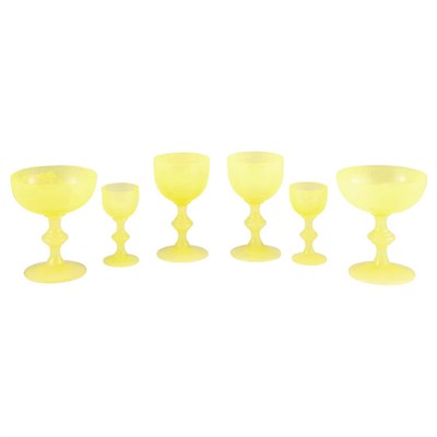 Lot 499 - Opaline Glass Stemware Service In pale yellow,...