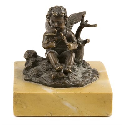 Lot 346 - Bronze Figure of Cupid Modeled in a seated...