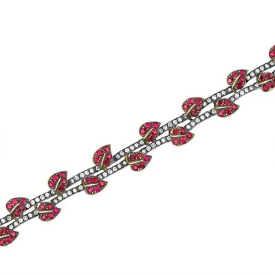 Lot 115 - Blackened Gold, Gold, Diamond and Ruby Bracelet