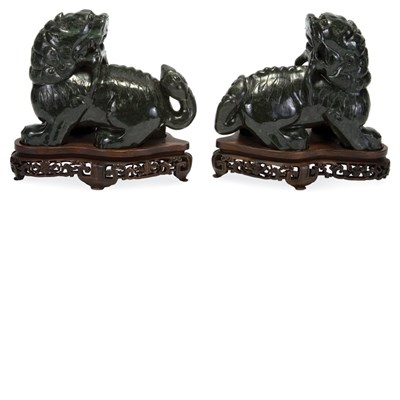Lot 268 - Pair of Chinese Dark Green Jade Figures of Foo...