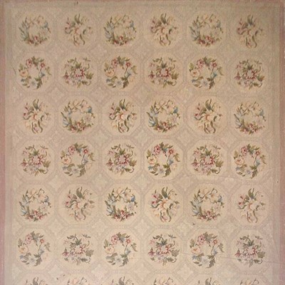 Lot 562 - Needlepoint Carpet England, late 19th century...