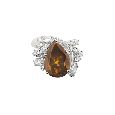 Lot 306 - White Gold, Fancy Dark Yellow-Brown Diamond and Diamond Ring