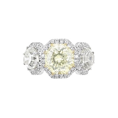 Lot 428 - Yellow Diamond and Diamond Ring