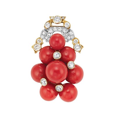 Lot 429 - Gold, Platinum, Oxblood Coral and Diamond Clip-Brooch