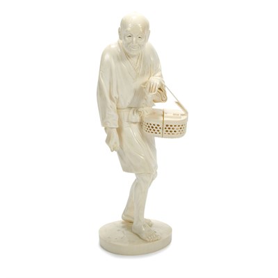 Lot 135A - Japanese Okimono of a Farmer Late 19th century...