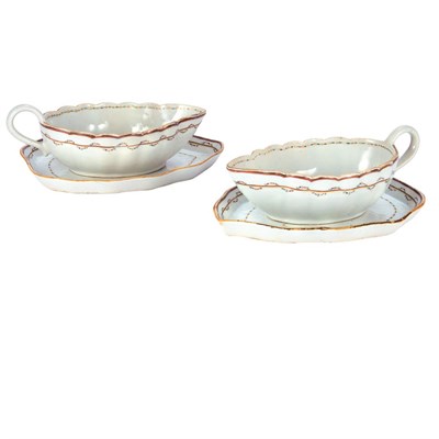 Lot 506 - Two Chinese Export Armorial Porcelain Gravy...