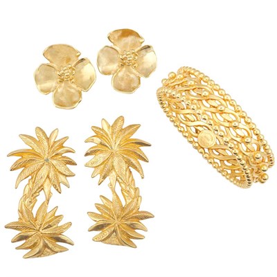 Lot 352 - Dominique Aurientis Bangle Bracelet and Pair of Palm Tree Earclips and Pair of Robert Lee Morris Flower Earrings
