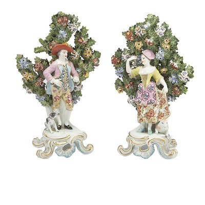 Lot 559 - Pair of Porcelain Figures Each dressed in 18th...
