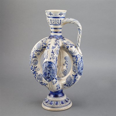 Lot 226 - German Salt Glazed Jug Molded with masks and...