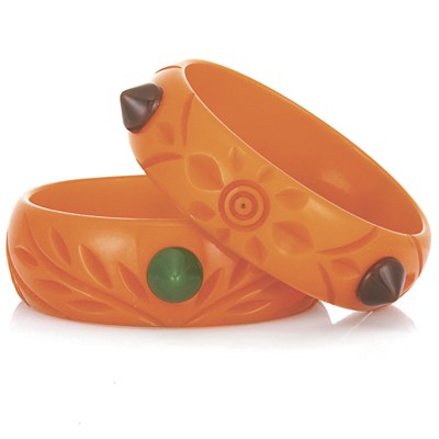 Lot 97 - Pair of Carved Orange Bakelite Bangle Bracelets