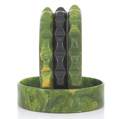 Lot 32 - One Bakelite and Three Celluloid Bangle Bracelets