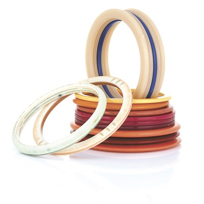 Lot 19 - Sixteen Multicolored Celluloid Bangle Bracelets