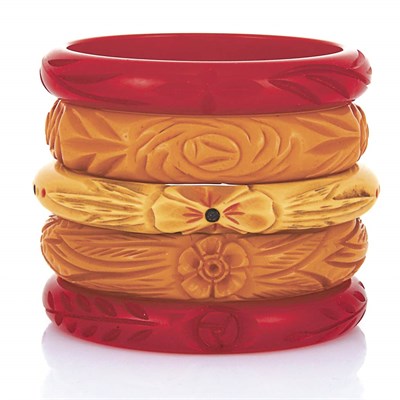 Lot 30 - One Celluloid and Four Bakelite Bangle Bracelets