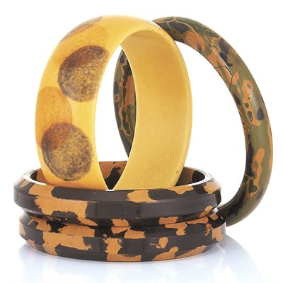 Lot 6 - Four Celluloid Bangle Bracelets