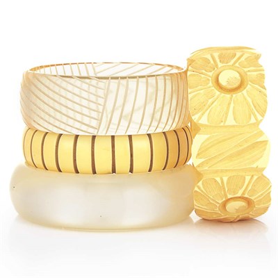 Lot 10 - Two Bakelite and Two Celluloid Bangle Bracelets