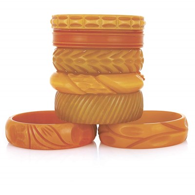 Lot 22 - One Plastic and Six Bakelite Bangle Bracelets