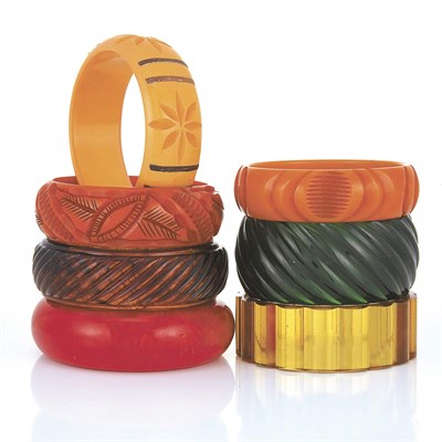 Lot 31 - Four Bakelite and Three Celluloid Cuff Bangle Bracelets