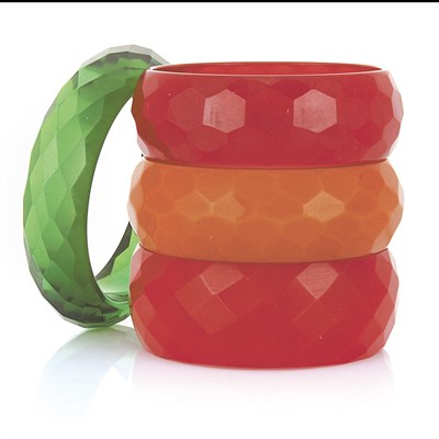 Lot 18 - One Bakelite and Three Celluloid Cuff Bangle Bracelets