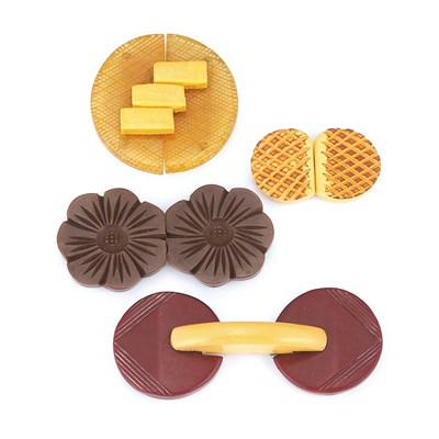 Lot 46 - Four Bakelite and Celluloid Belt Buckles
