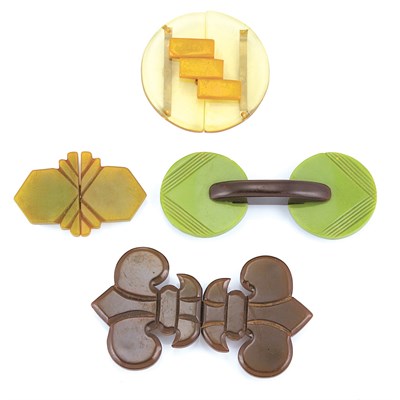 Lot 51 - Four Bakelite and Celluloid Belt Buckles
