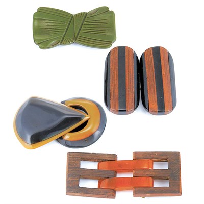 Lot 56 - Four Bakelite and Wood Belt Buckles