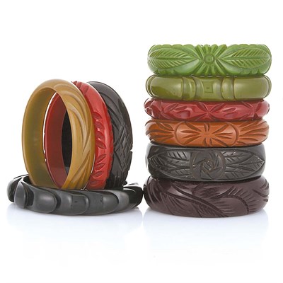 Lot 88 - Ten Carved Bakelite Bangle Bracelets
