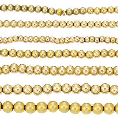 Lot 131 - Seven Gold Bead Necklaces