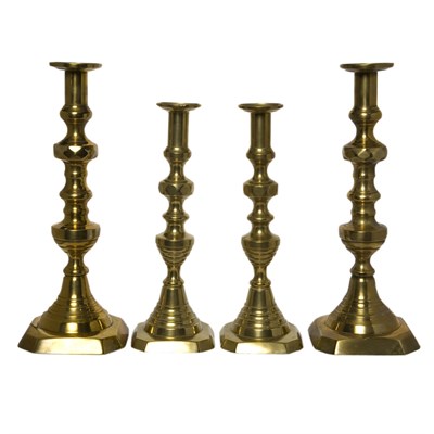 Lot 314 - Two Pairs of Georgian Style Brass Candlesticks...