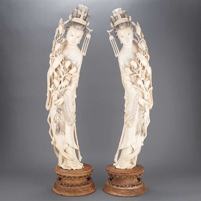 Lot 384 - Pair of Chinese Ivory Figures of Maidens Early...
