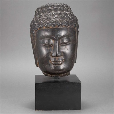 Lot 383 - Chinese Stone Head of Buddha The round face...