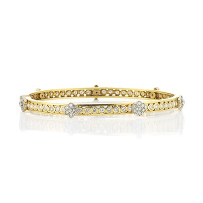 Lot 220 - Gold and Diamond Bangle Bracelet