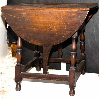 Lot 409 - William and Mary Style Oak Drop-Leaf Table...