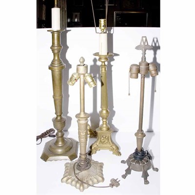 Lot 418 - Group of Four Neoclassical Style Brass Lamps