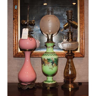 Lot 524 - Group of Three Victorian Style Oil Lamps Each...