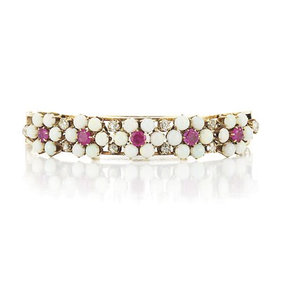 Lot 330 - Gold, Opal, Ruby and Diamond Floret Bangle Bracelet