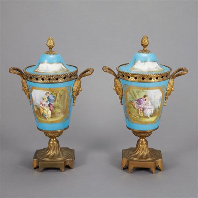 Lot 88 - Pair of Sevres Style Porcelain Urns Each domed...
