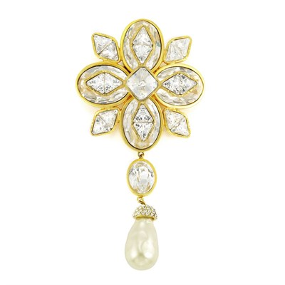Lot 1121 - Dangling Pin Bright gold-tone metal set with...