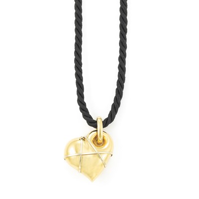 Lot 698 - Gold Heart Pendant with Two Silk Cord Necklaces