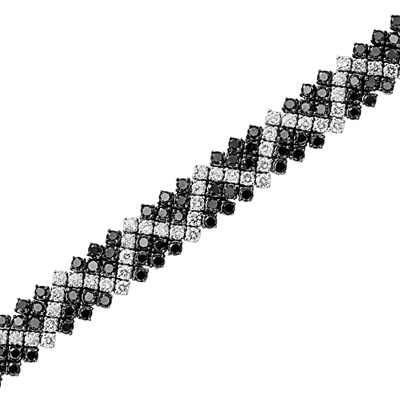 Lot 147 - White Gold, Diamond and Black Diamond Bracelet