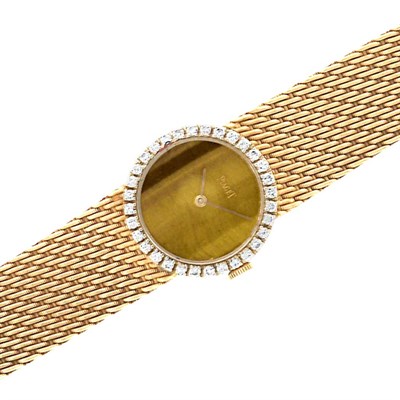Lot 76 - Gold, Tiger's Eye and Diamond Wristwatch, Piaget
