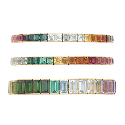Lot 83 - Three Gold and Multicolored Gem-Set Bracelets