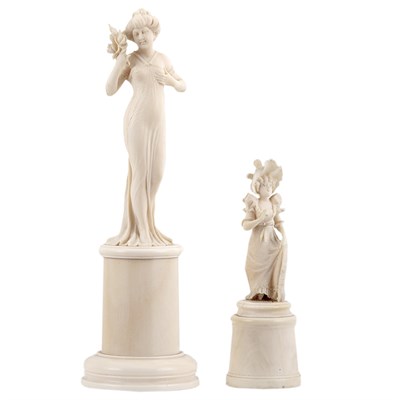 Lot 427 - Two Continental Carved Ivory Figures of Women...
