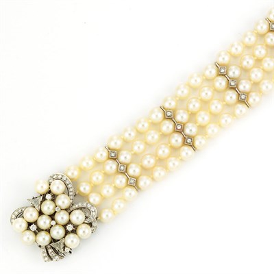 Lot 232 - Four Strand Cultured Pearl, White Gold and Diamond Bracelet