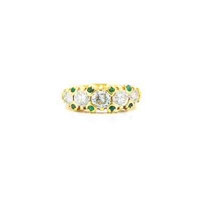Lot 556 - Gold, Diamond and Emerald Ring