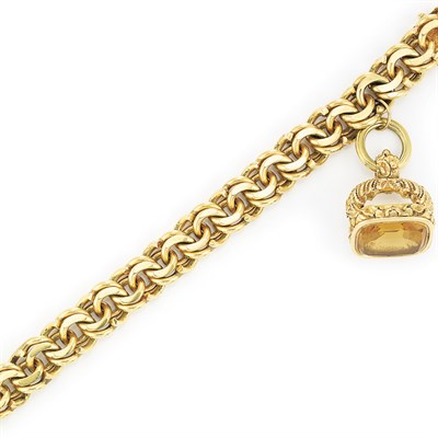 Lot 155 - Gold Curb Link Bracelet with Antique Gold and Citrine Fob Charm