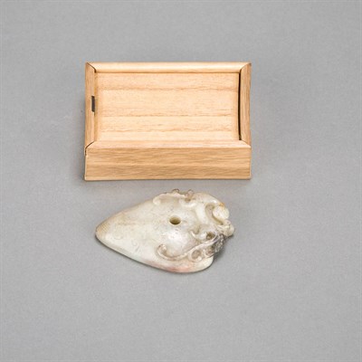 Lot 260 - Chinese Celadon Jade Toggle Of archaic style,...